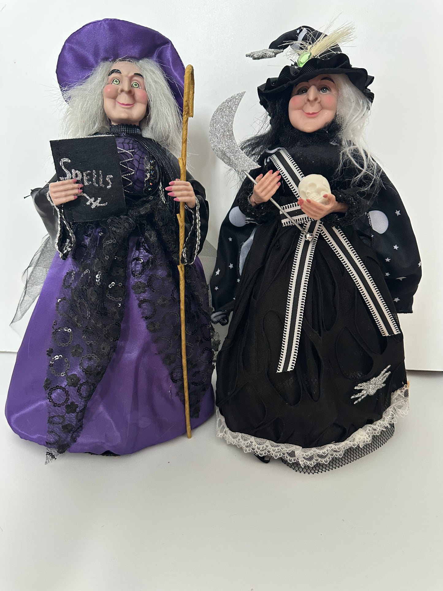 Witch with Purple Dress and Book of Spells