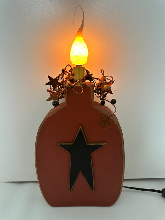 Wooden Bottle Lamp with a Star Design, Pip Berries and Rustic Star Wreath