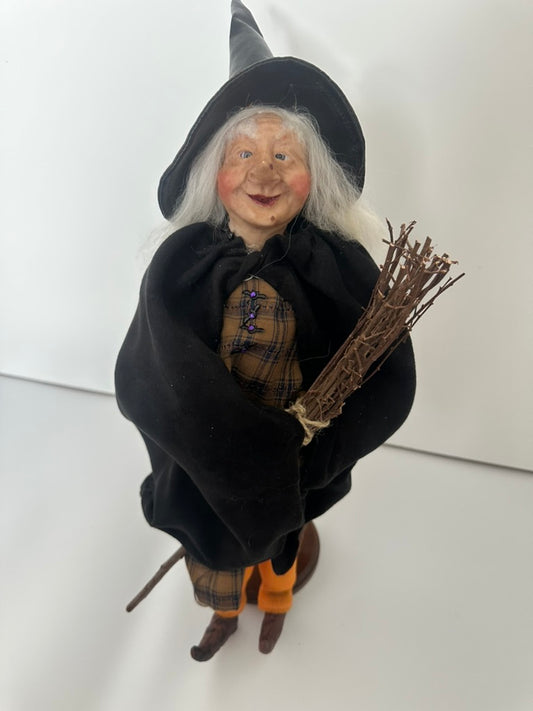 Old Witch with Black Cape and Black Leather Hat