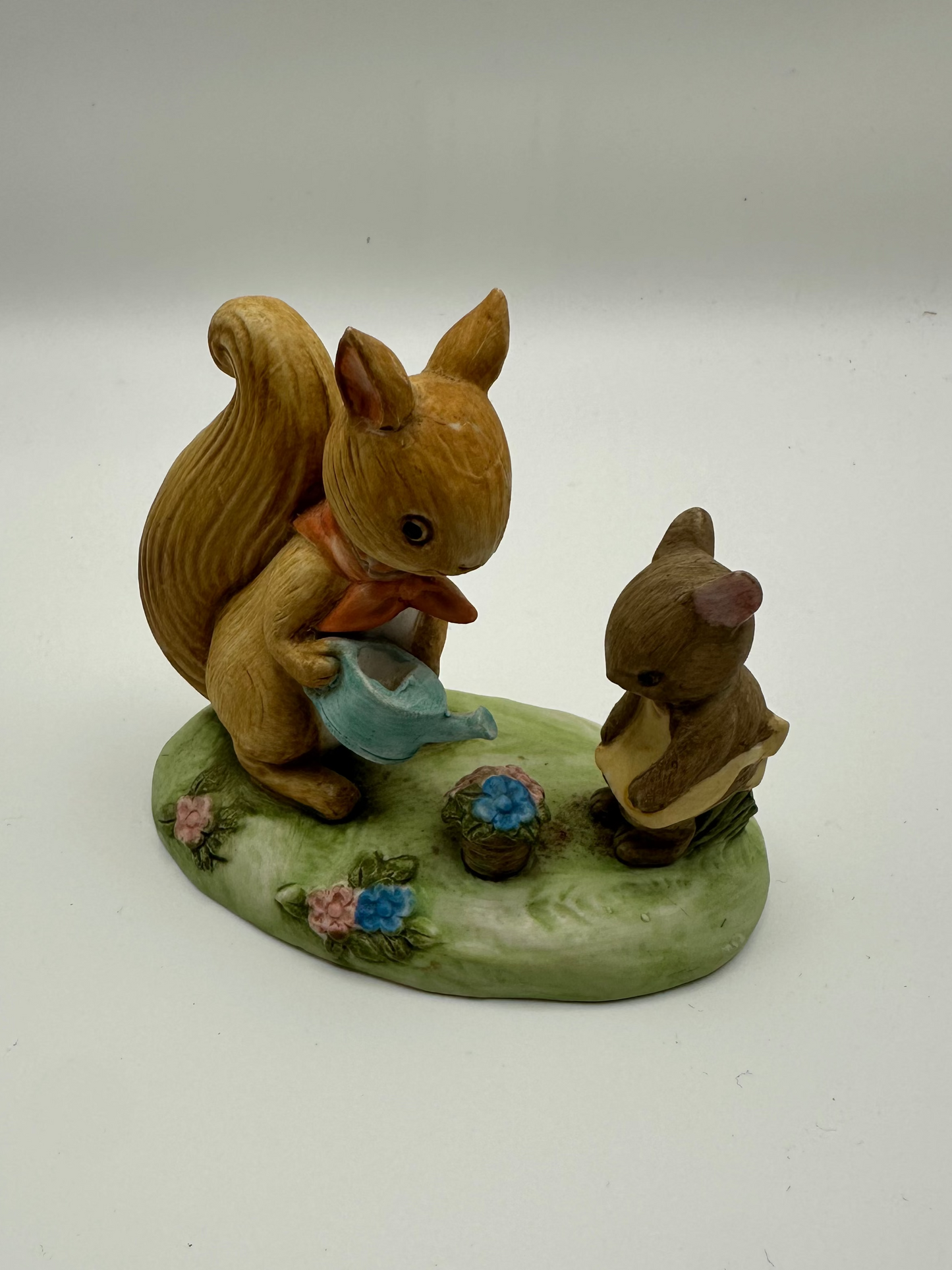 Squirrels Watering Flowers Hand Painted Figurine