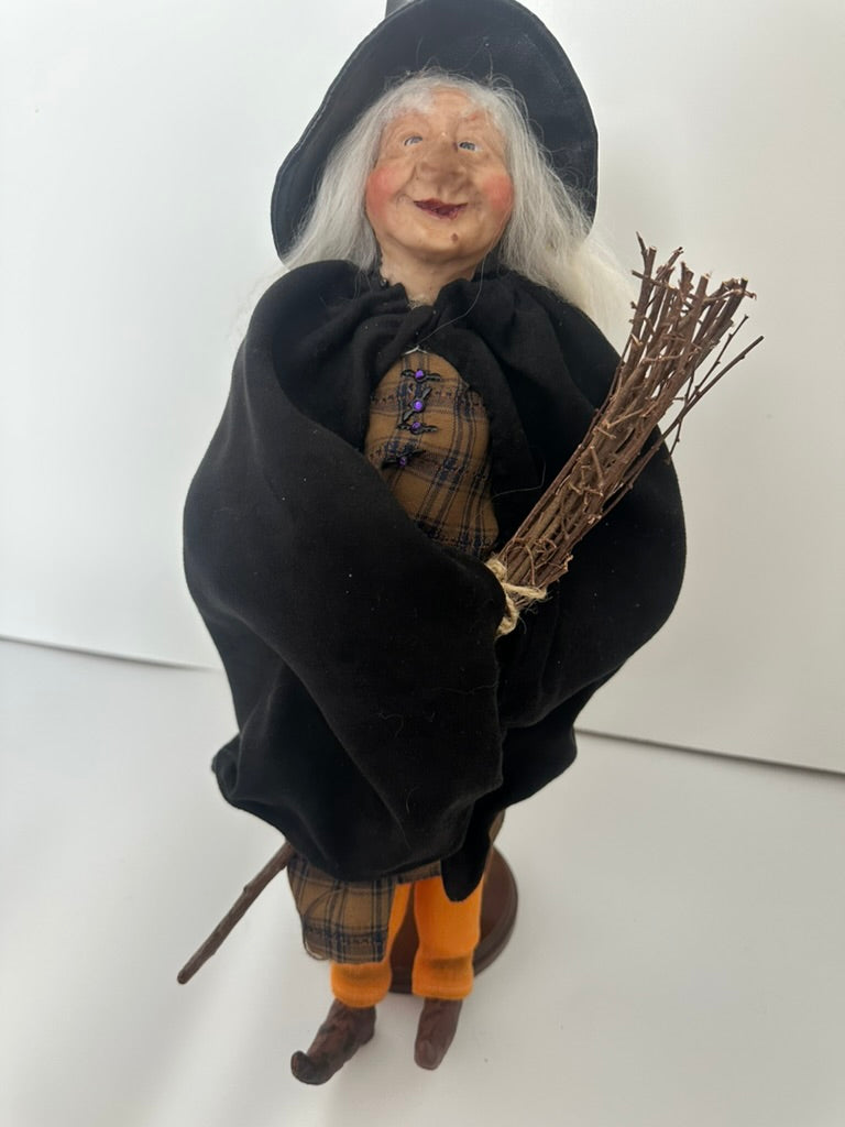 Old Witch with Black Cape and Black Leather Hat