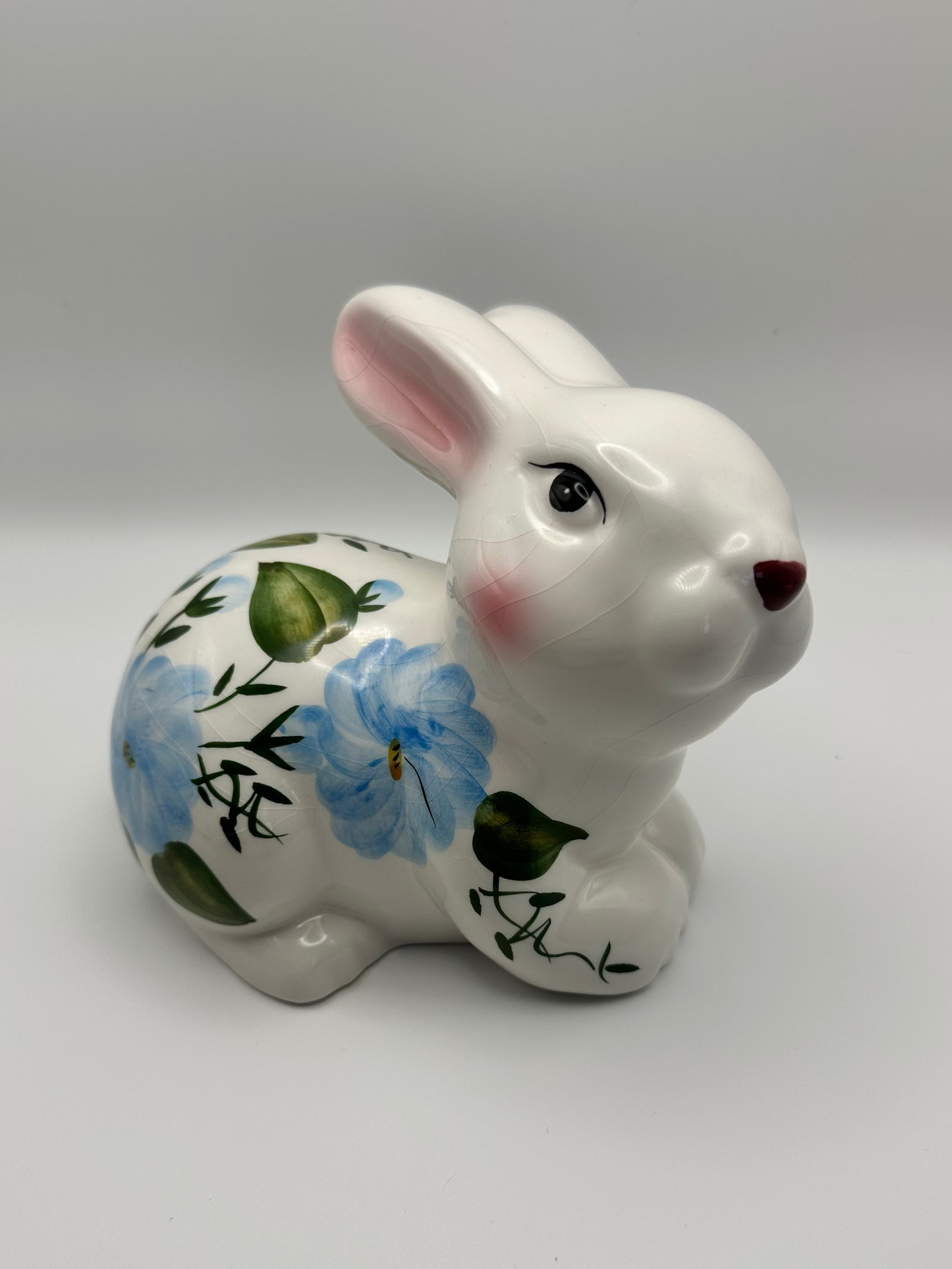 White Ceramic Bunny with Blue Flowers, Laying