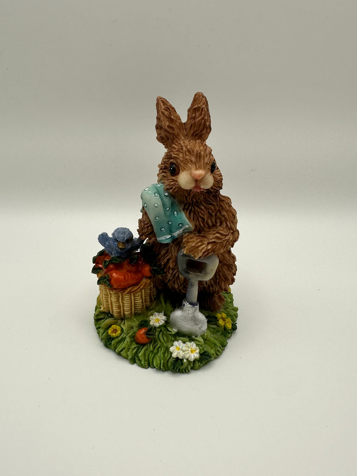 Brown Rabbit with Blue Towel and Shovel